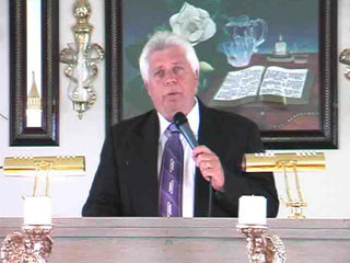 graphic of Evangelist Mark Duplantis in a television commercial for Emmanuel House of Praise Church in Poplar Bluff Missouri